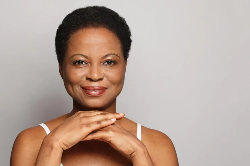 plastic surgeon near lansing